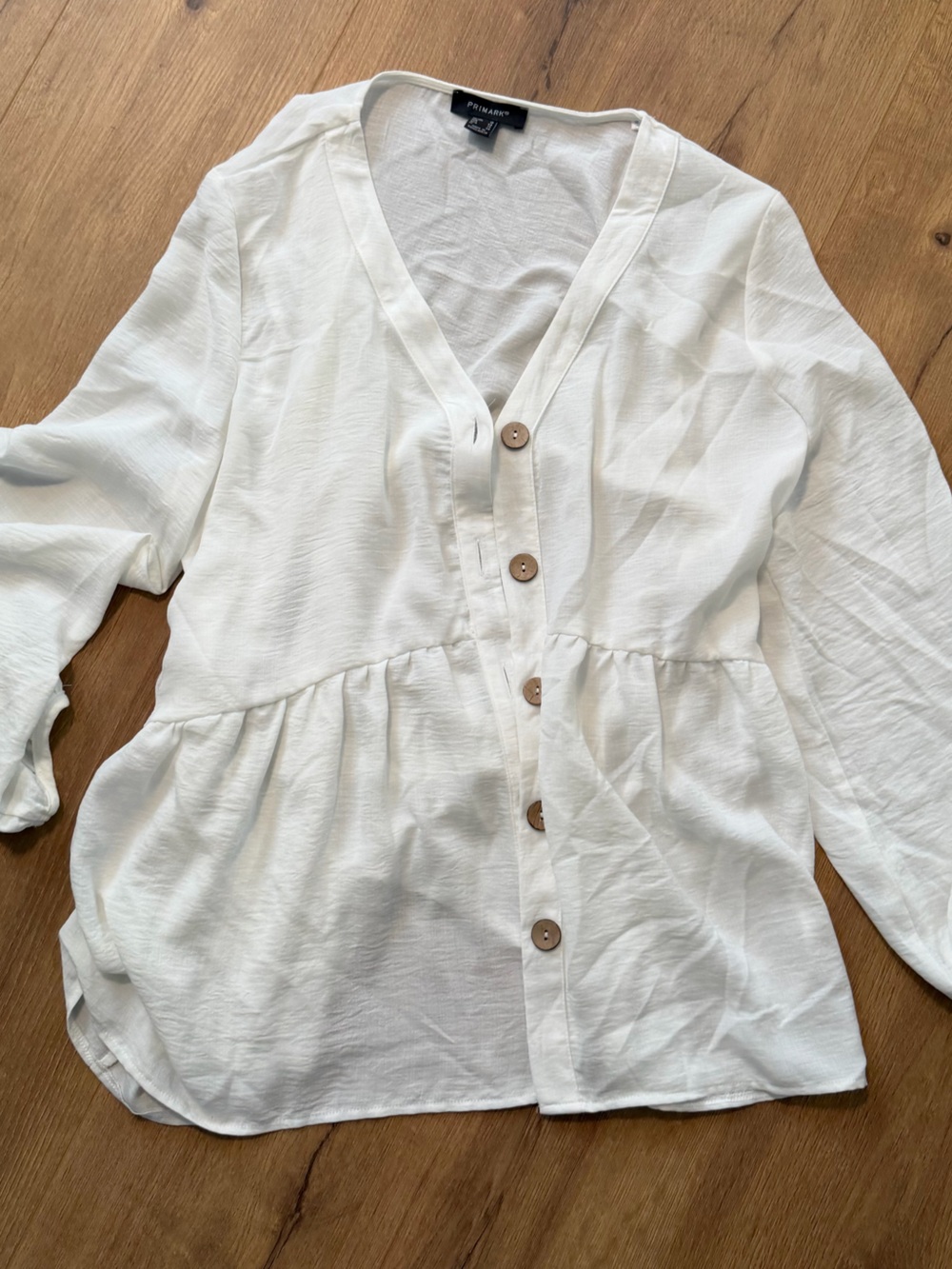 White V-Neck Button-Front Peplum Blouse